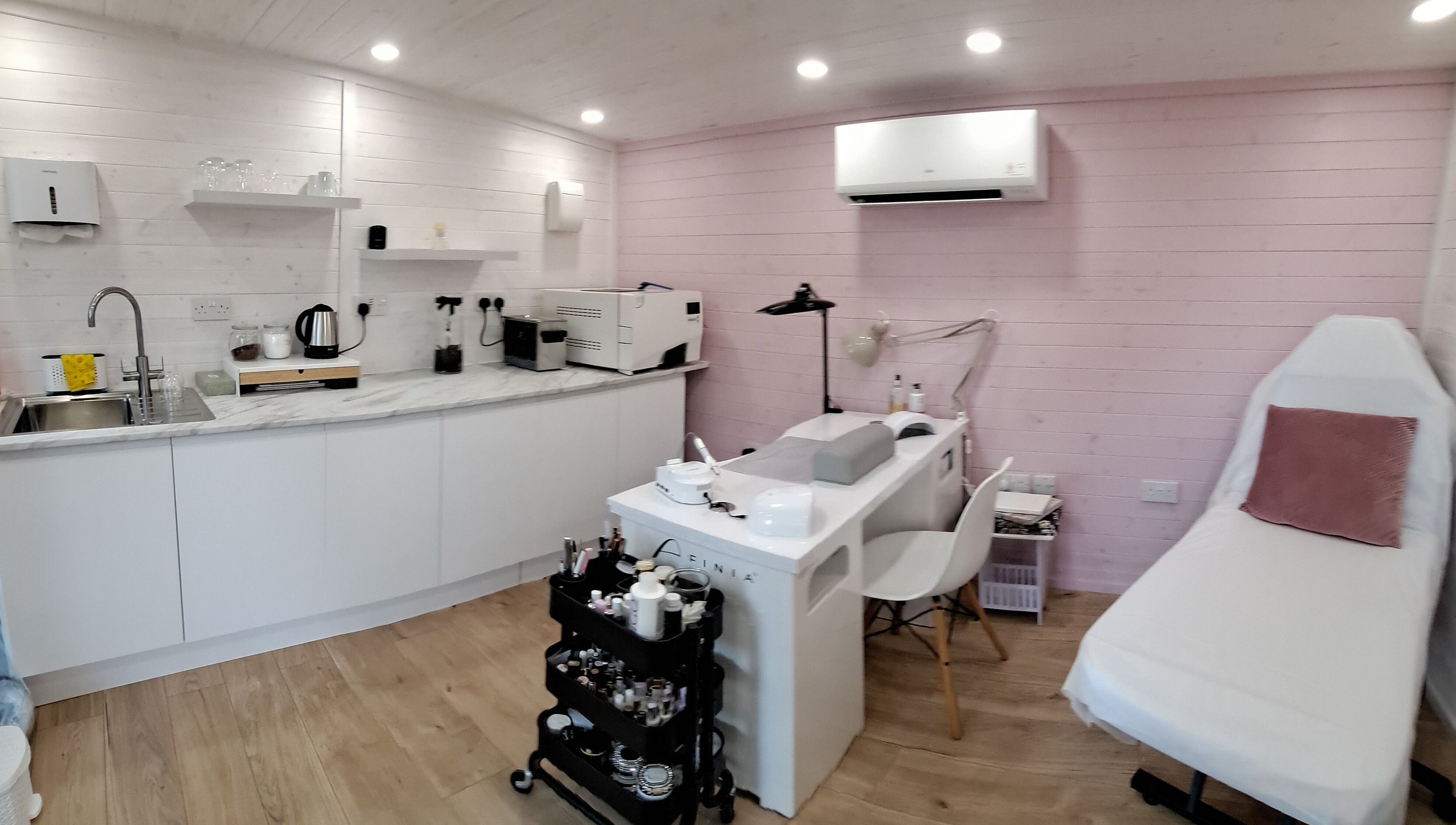 Modern interior of MB Beauty Nails featuring a manicure station and cozy decor in Spalding, England, GB.