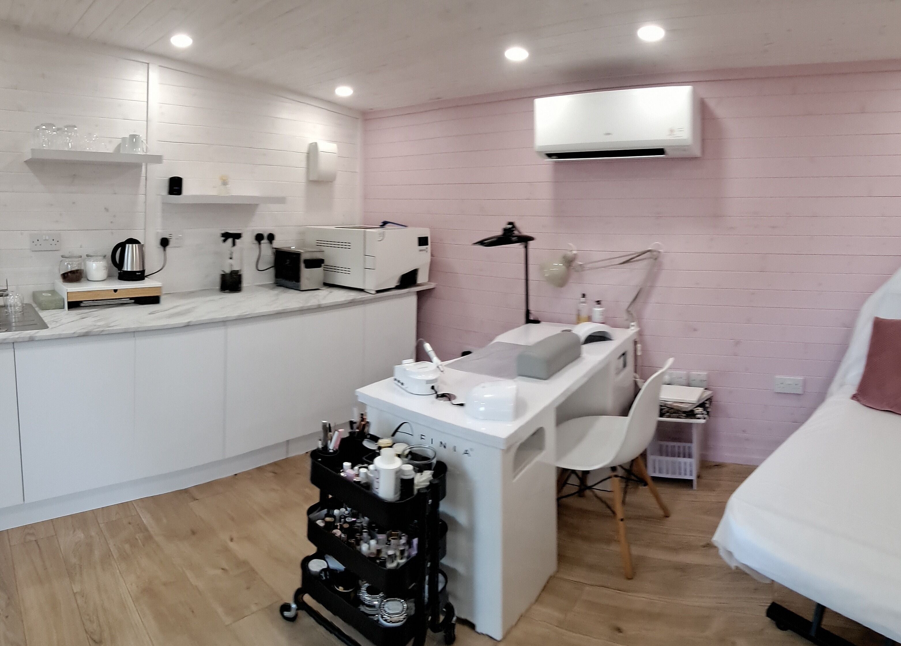 Modern interior of MB Beauty Nails featuring a manicure station and cozy decor in Spalding, England, GB.