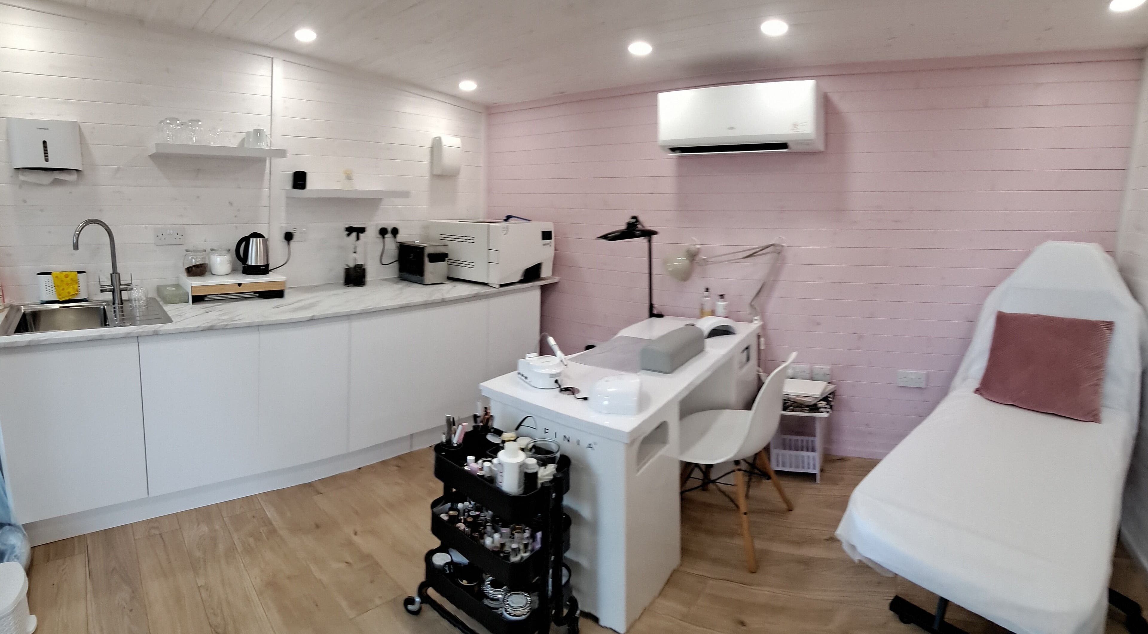 Modern interior of MB Beauty Nails featuring a manicure station and cozy decor in Spalding, England, GB.
