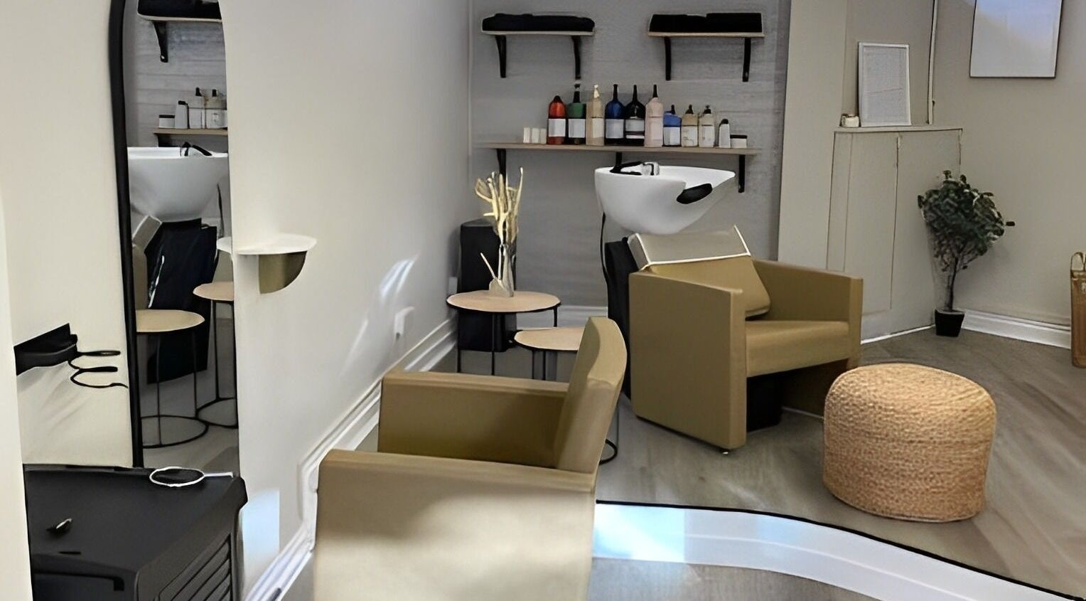 Sophisticated interior of 24 The Salon in Stafford, England, GB featuring stylish chairs and modern decor.