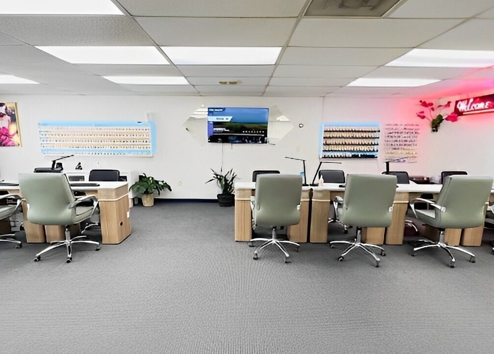 Modern interiors of L & T Nails Salon in Northborough, Massachusetts, US, showcasing chic nail stations.