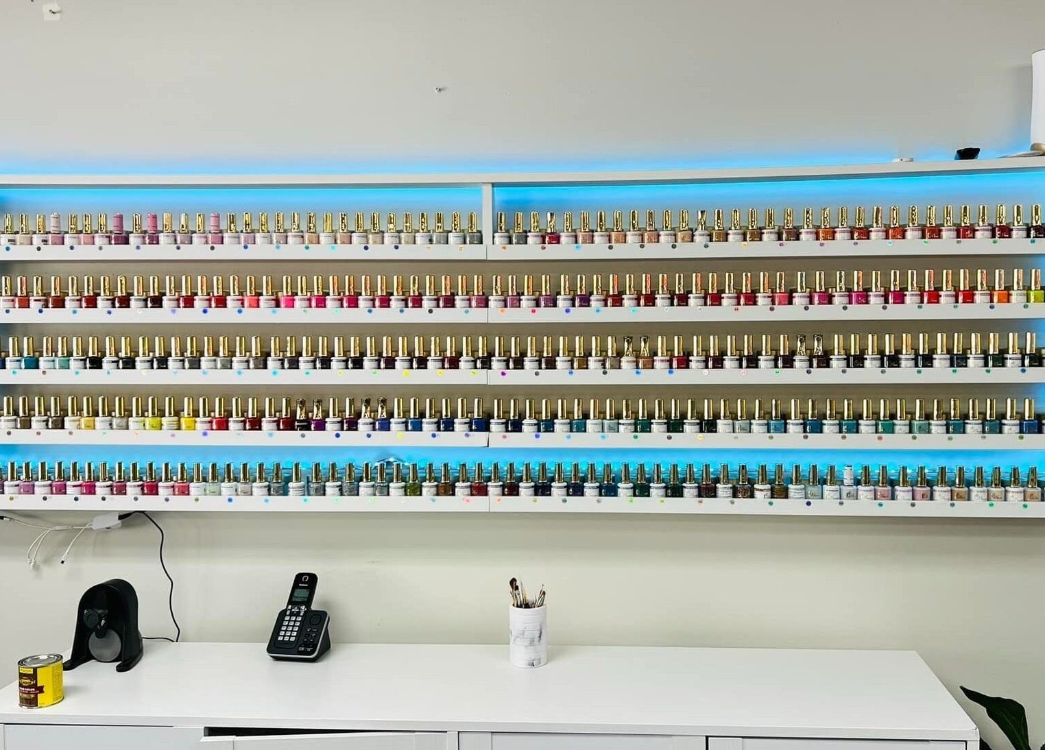 A vibrant display of nail polishes at L & T Nails Salon, Northborough, Massachusetts, US.