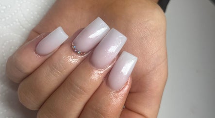 Elegant nail art with rhinestones at Beauty by Emily, Plymouth, England, GB showcasing expert design.