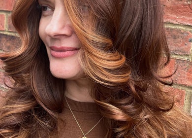 Close-up of styled curly hair by Lisa Campbell Hairdressing at The Lounge Hair & Beauty Ltd Beachampton, England, GB.