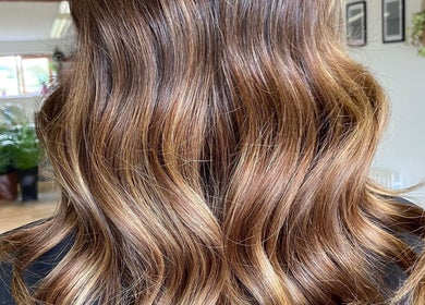 Beautiful wavy hair styled at Lisa Campbell Hairdressing at The Lounge Hair & Beauty Ltd Beachampton, England.