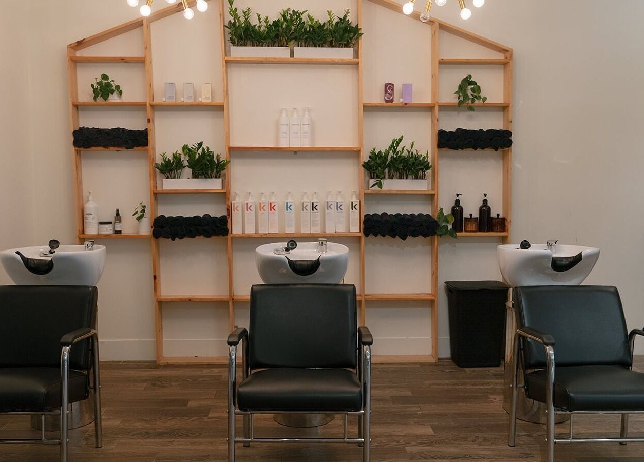 Modern salon chairs and sinks at Glow Hair Studio, Thorold, Ontario, CA.