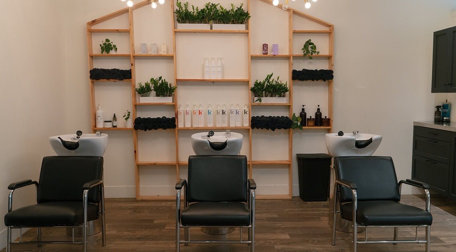 Modern salon chairs and sinks at Glow Hair Studio, Thorold, Ontario, CA.