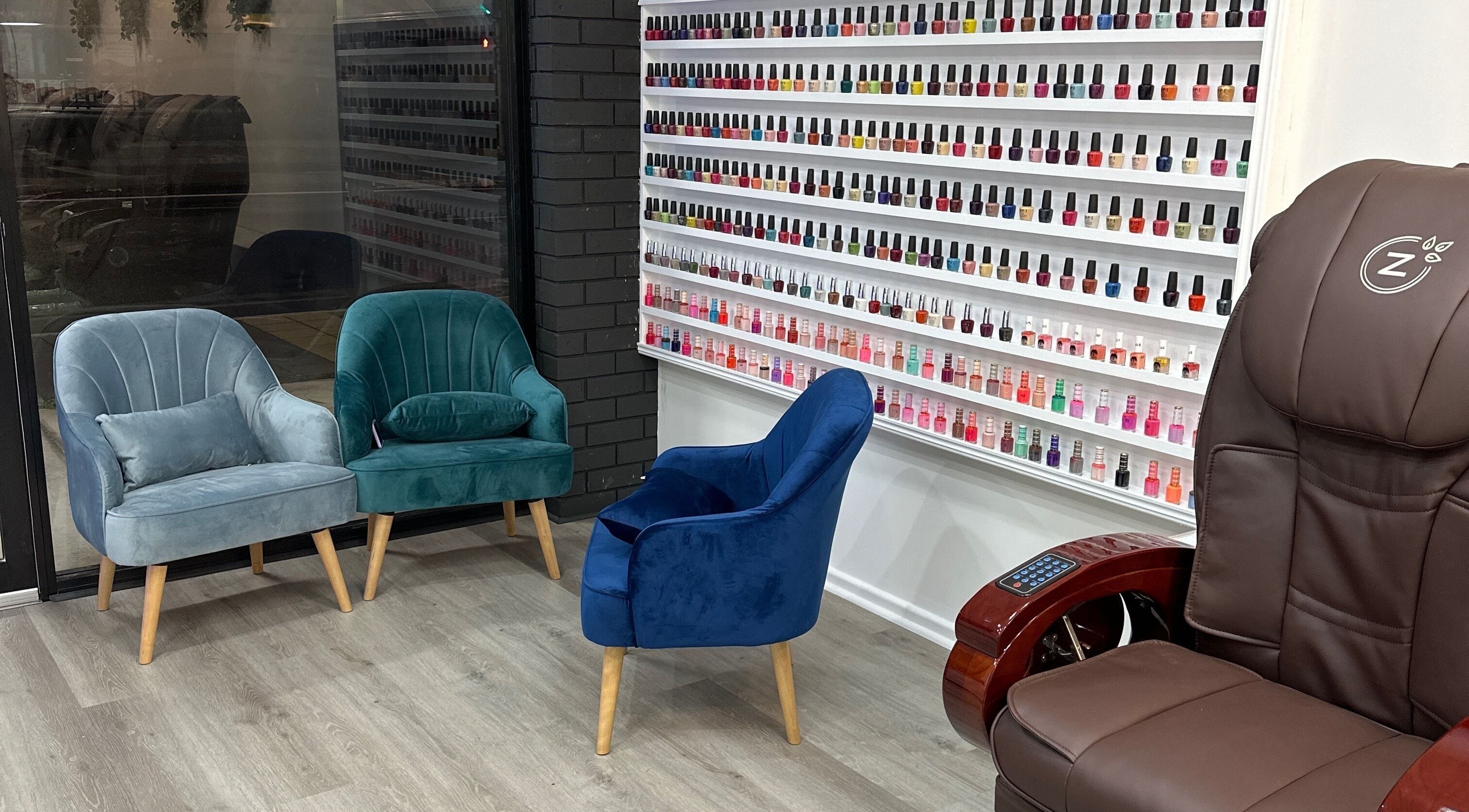 Jade Nails Spa in Woodville West, South Australia showcases vibrant nail polish options and plush seating for relaxation.