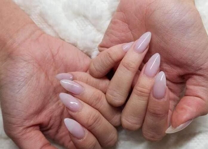 Elegant manicure at Jade Nails Spa, Woodville West, South Australia, AU showcases sophisticated nail art.