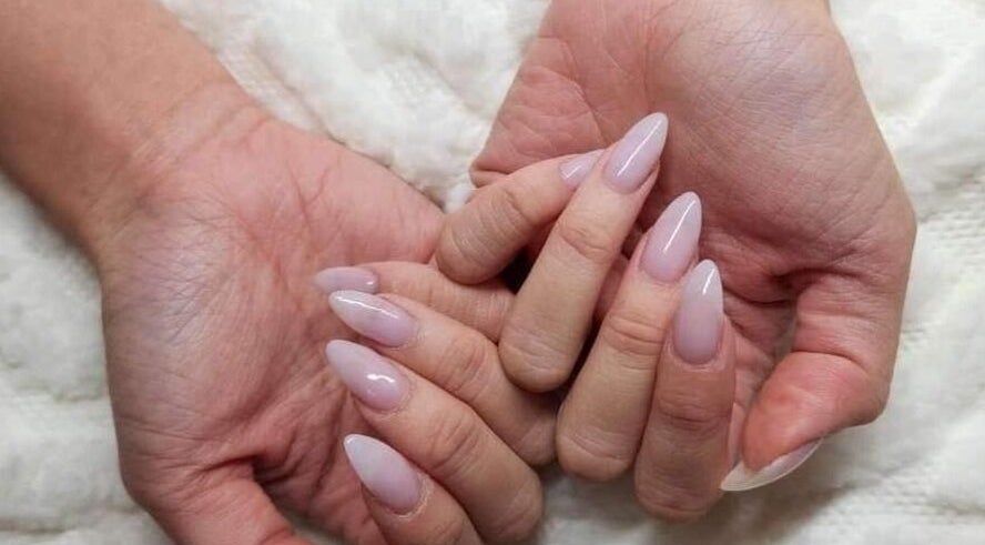 Elegant manicure at Jade Nails Spa, Woodville West, South Australia, AU showcases sophisticated nail art.