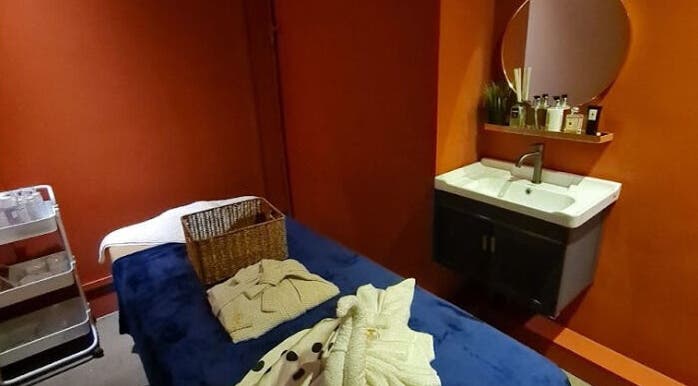 Relaxing treatment room at The Ruumah Spa Signature, Petaling Jaya, Selangor, MY, featuring soothing decor.