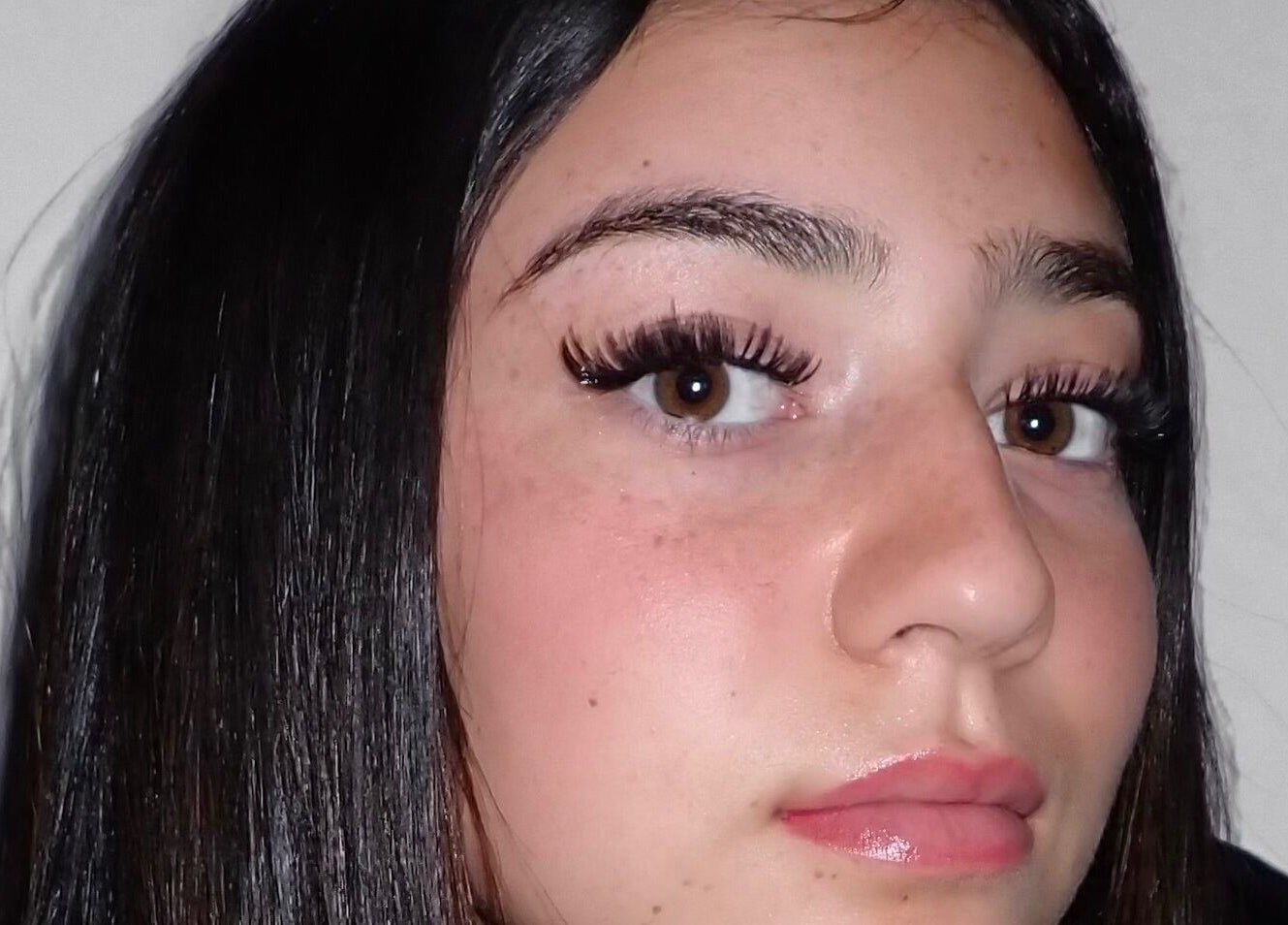 Close-up of a woman's lashes and brows at Lashnbeauty Co, Vaughan, Ontario, CA, showcasing natural beauty.