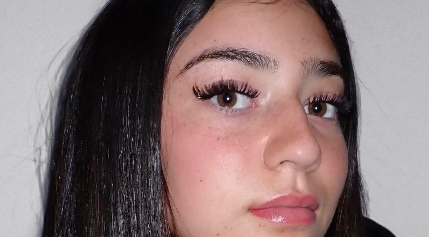 Close-up of a woman's lashes and brows at Lashnbeauty Co, Vaughan, Ontario, CA, showcasing natural beauty.