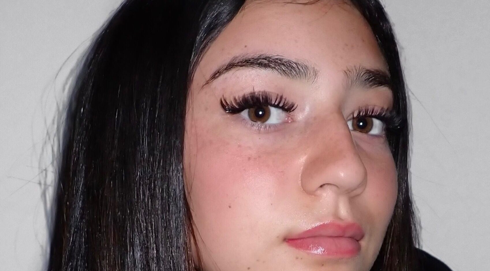 Close-up of a woman's lashes and brows at Lashnbeauty Co, Vaughan, Ontario, CA, showcasing natural beauty.