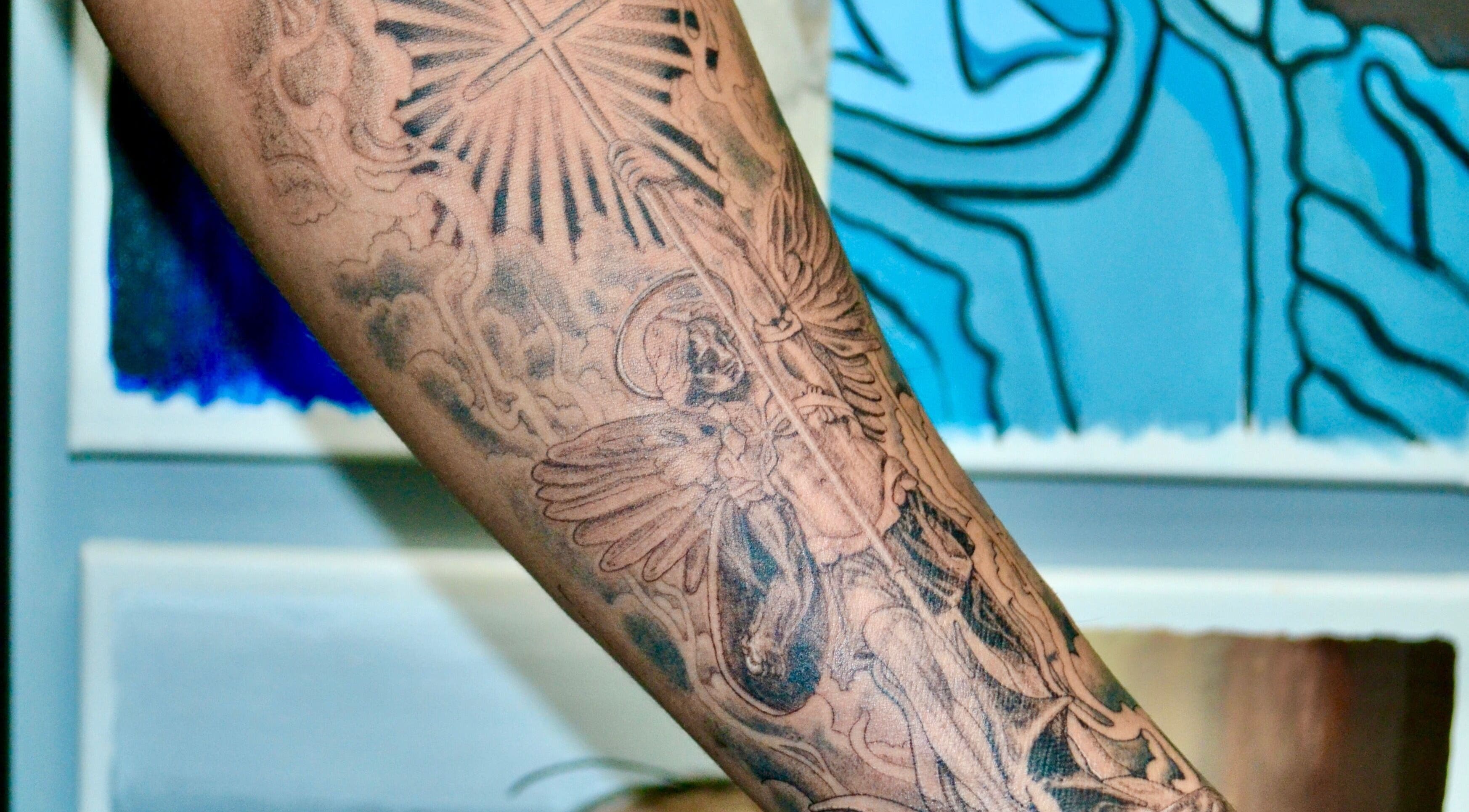 Detailed tattoo on arm at Casa Amor - Coming Soon in Hamilton, Ontario, CA.