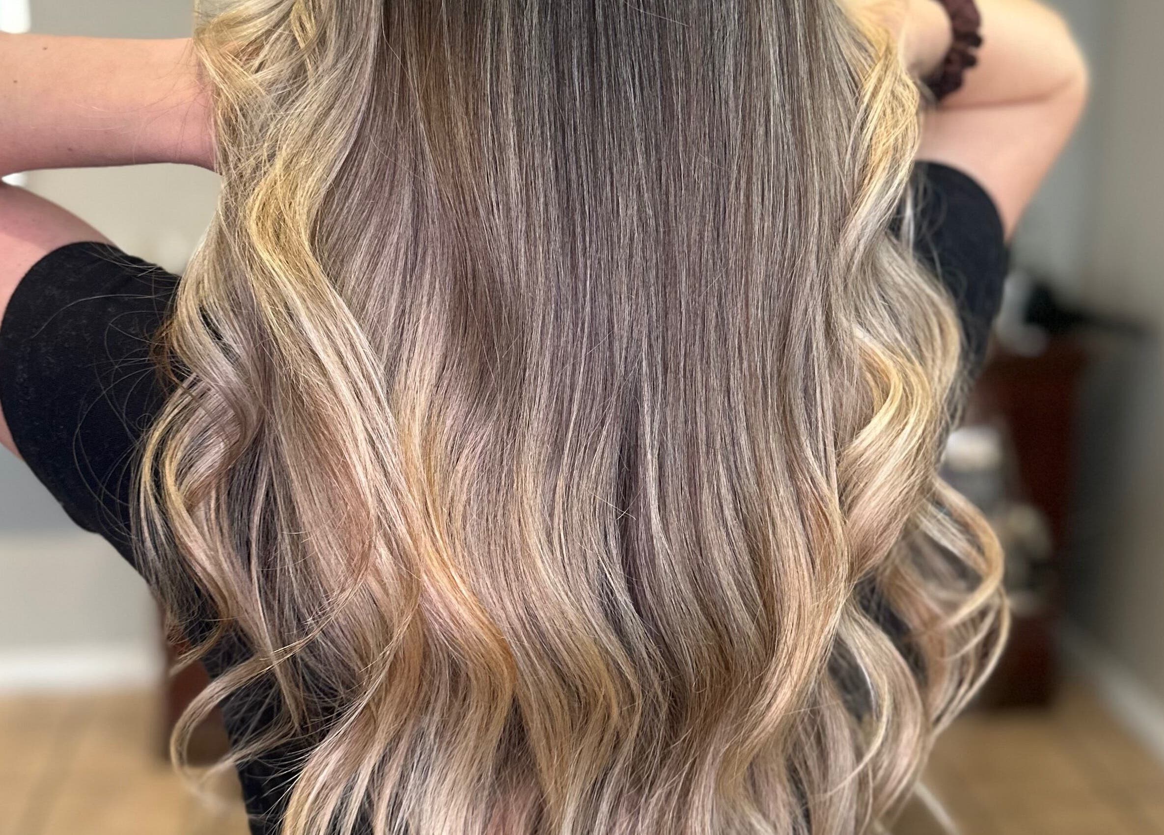 Blonde wavy hair at Casa Amor - Coming Soon in Hamilton, Ontario, CA, showcasing premium styling.