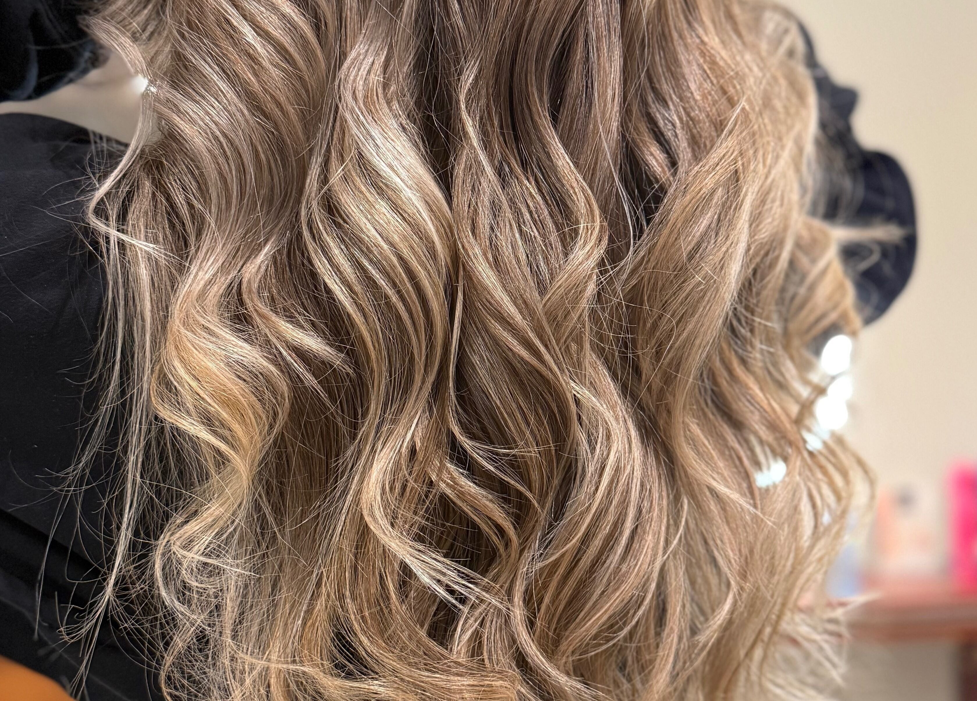 Beautiful wavy blonde hairstyle featured at Casa Amor - Coming Soon, Hamilton, Ontario, CA.