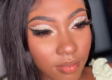Close-up of glittery eye makeup by Made up By Adele in Kingstown, VC, showcasing artistic beauty.