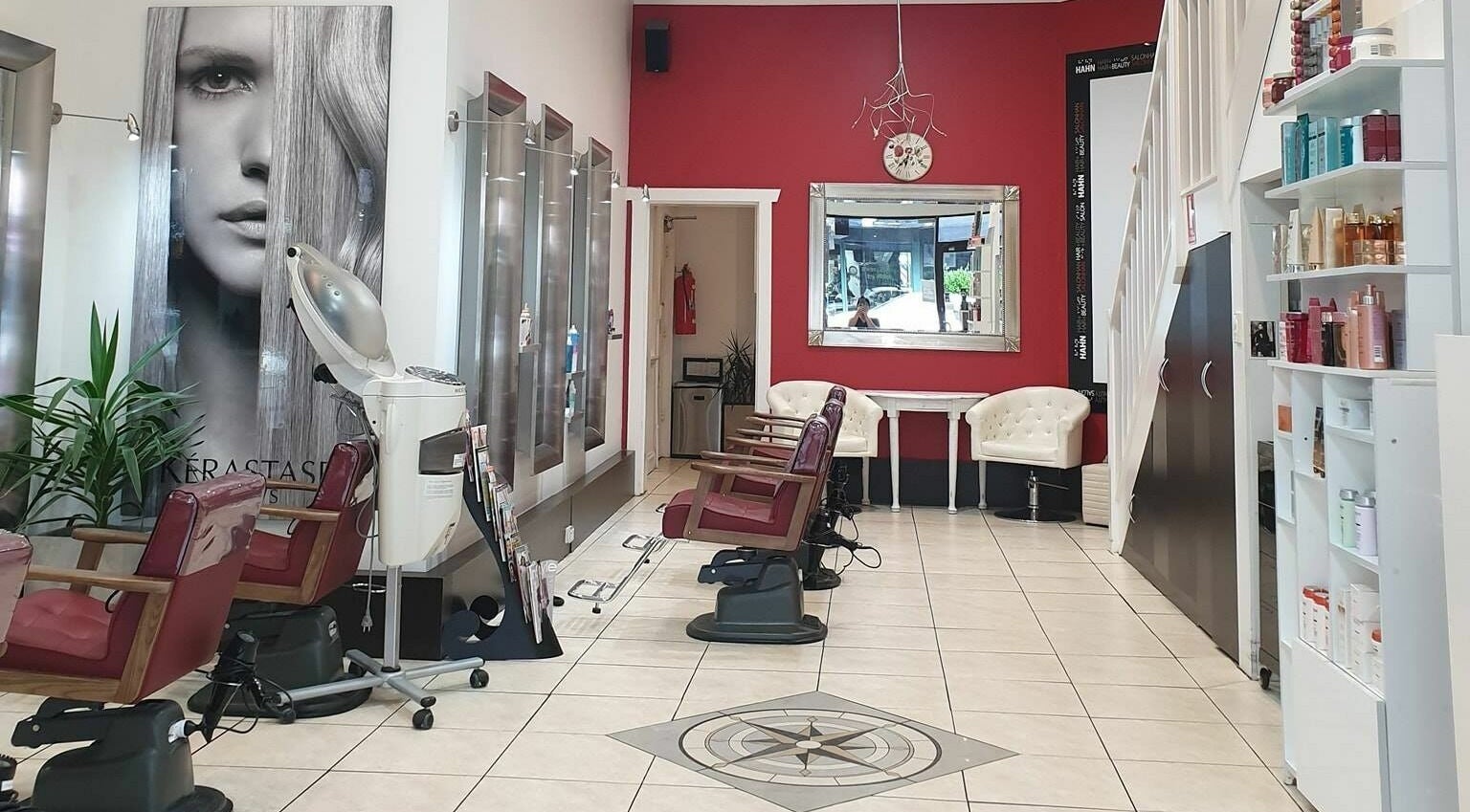 Chic interior of Hahn Beauty Hair Salon in Melbourne, Victoria, AU, showcasing salon chairs and modern decor.