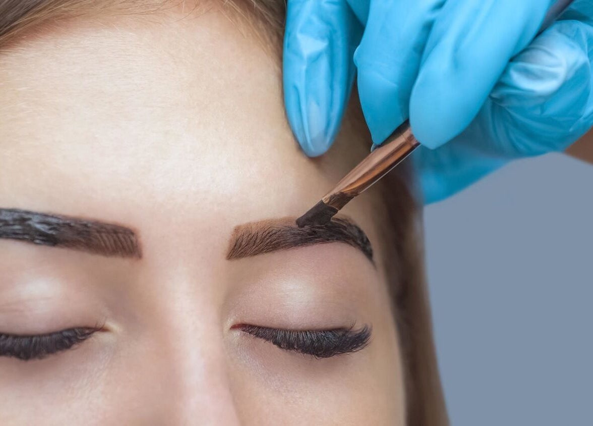 Eyebrow tinting at Luxe Aesthetics in Ajax, Ontario, CA, showcasing expert application for defined brows.