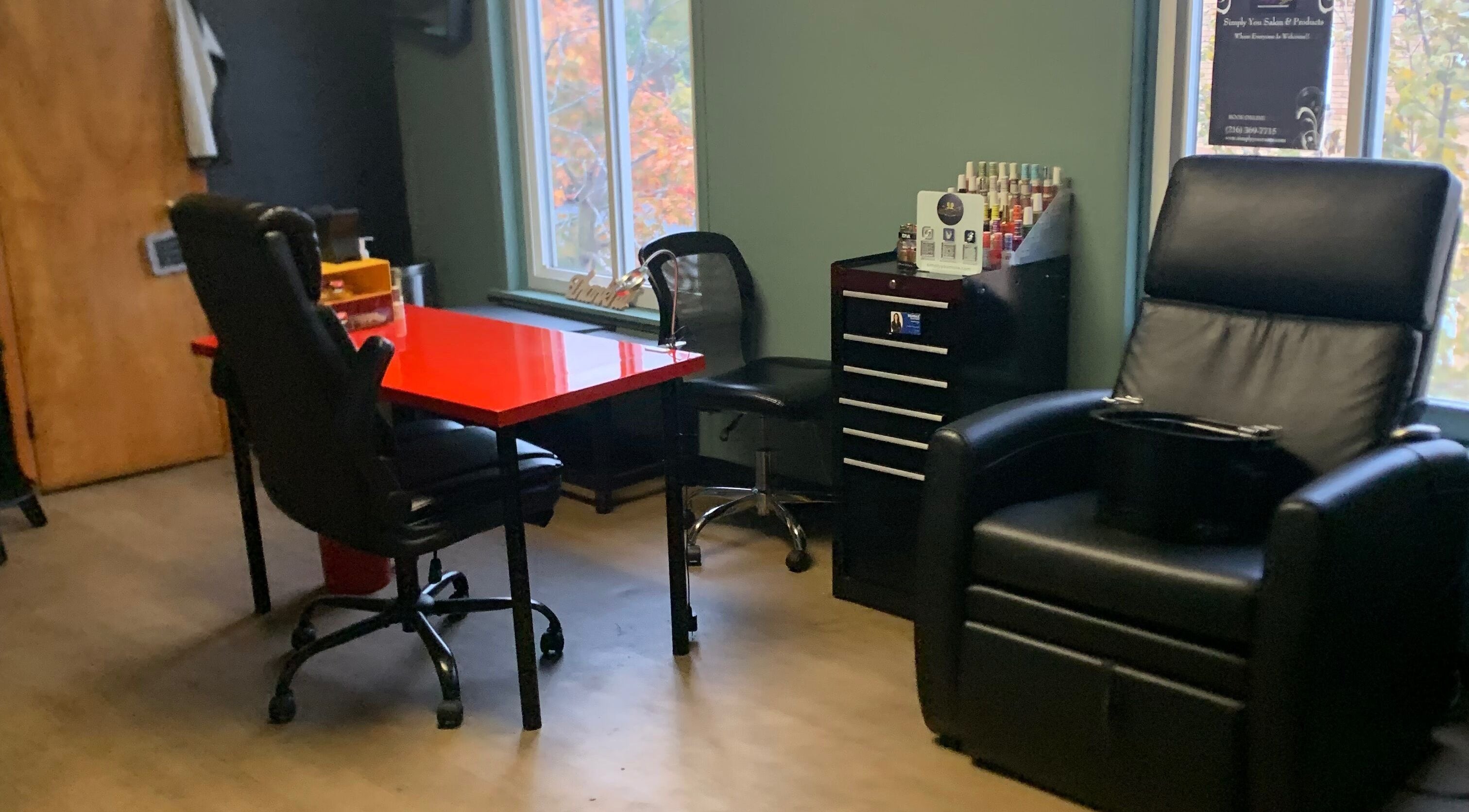 Cozy manicure station and seating at Simply You Salon & LLC, Parma, Ohio, US.