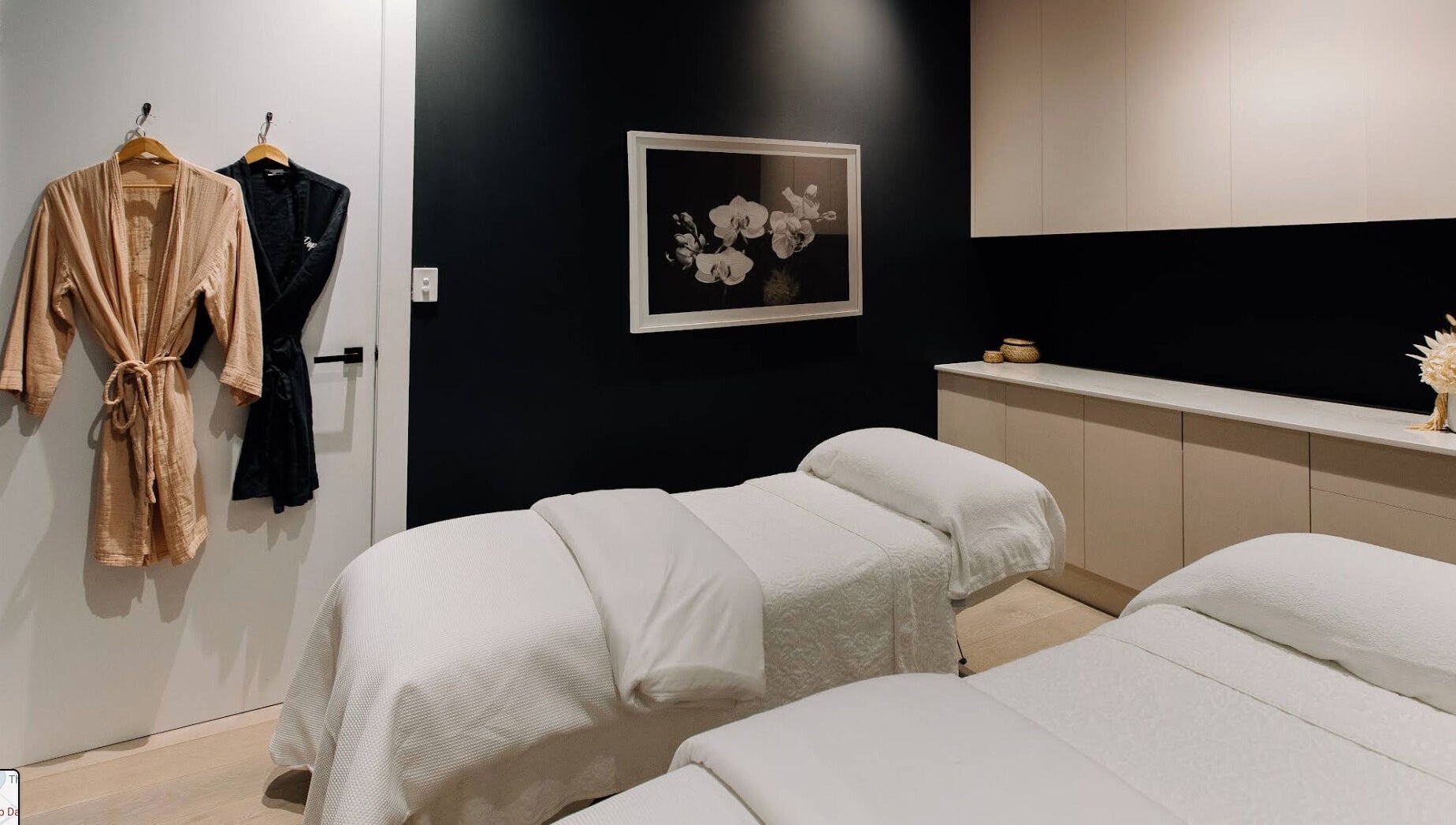 Elegant treatment room at Bump Day Spa, Double Bay, featuring cozy massage tables and robes. Double Bay, New South Wales, AU.