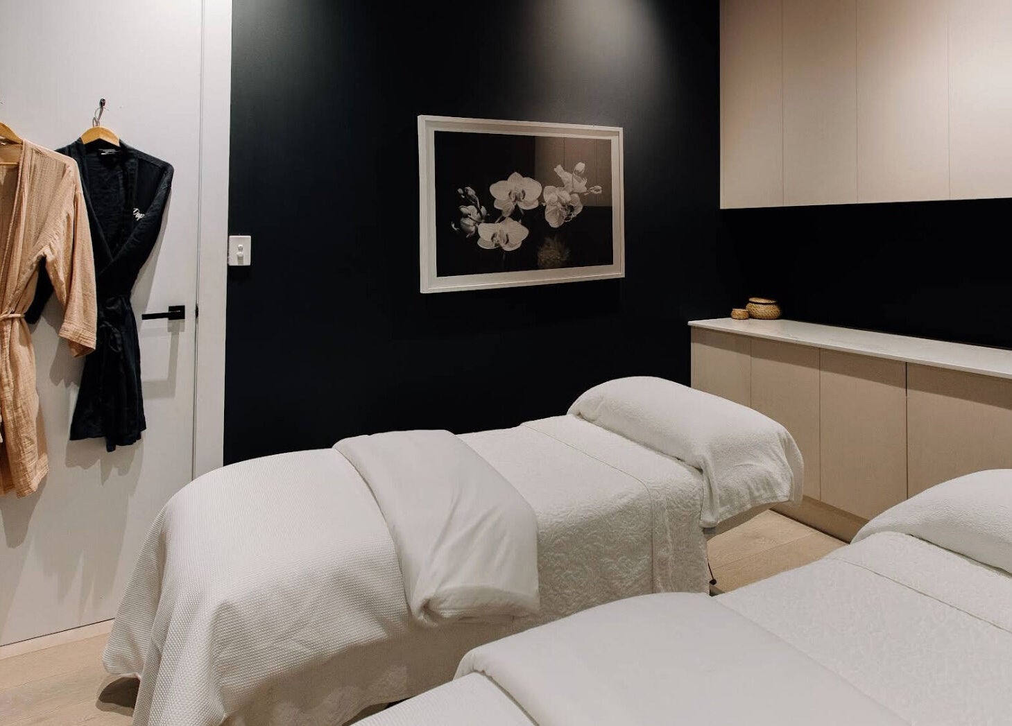 Elegant treatment room at Bump Day Spa, Double Bay, featuring cozy massage tables and robes. Double Bay, New South Wales, AU.