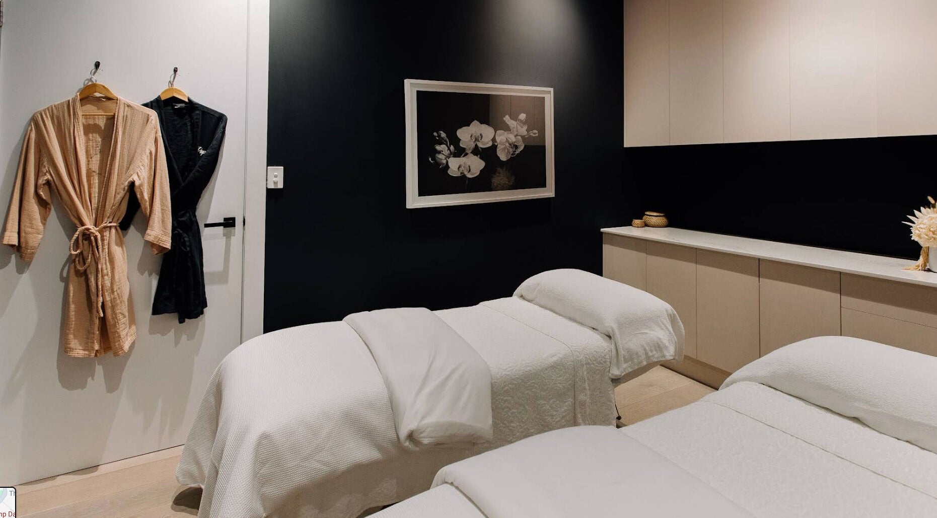 Elegant treatment room at Bump Day Spa, Double Bay, featuring cozy massage tables and robes. Double Bay, New South Wales, AU.