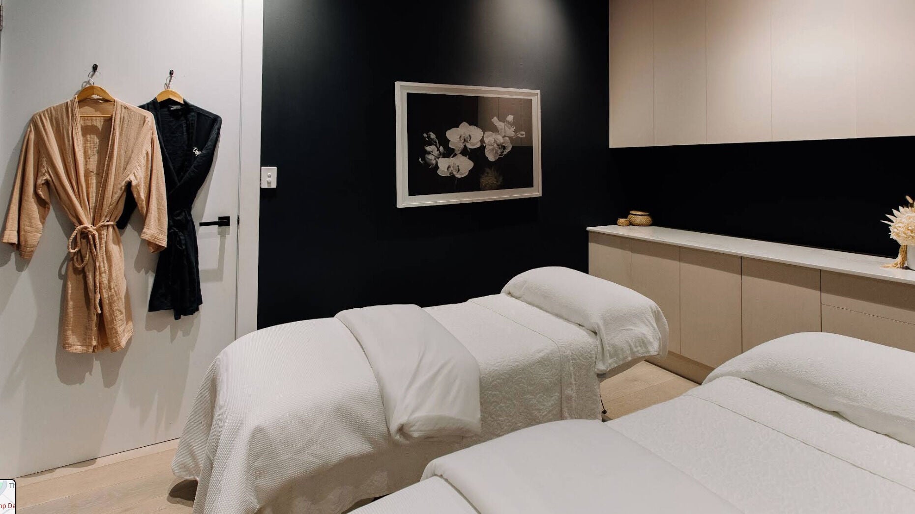 Elegant treatment room at Bump Day Spa, Double Bay, featuring cozy massage tables and robes. Double Bay, New South Wales, AU.