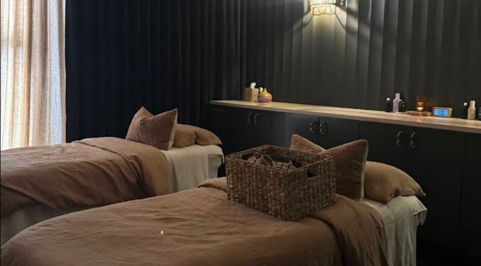 Relaxing treatment room at Bump Day Spa, Double Bay, New South Wales, AU with cozy linens and soft lighting.