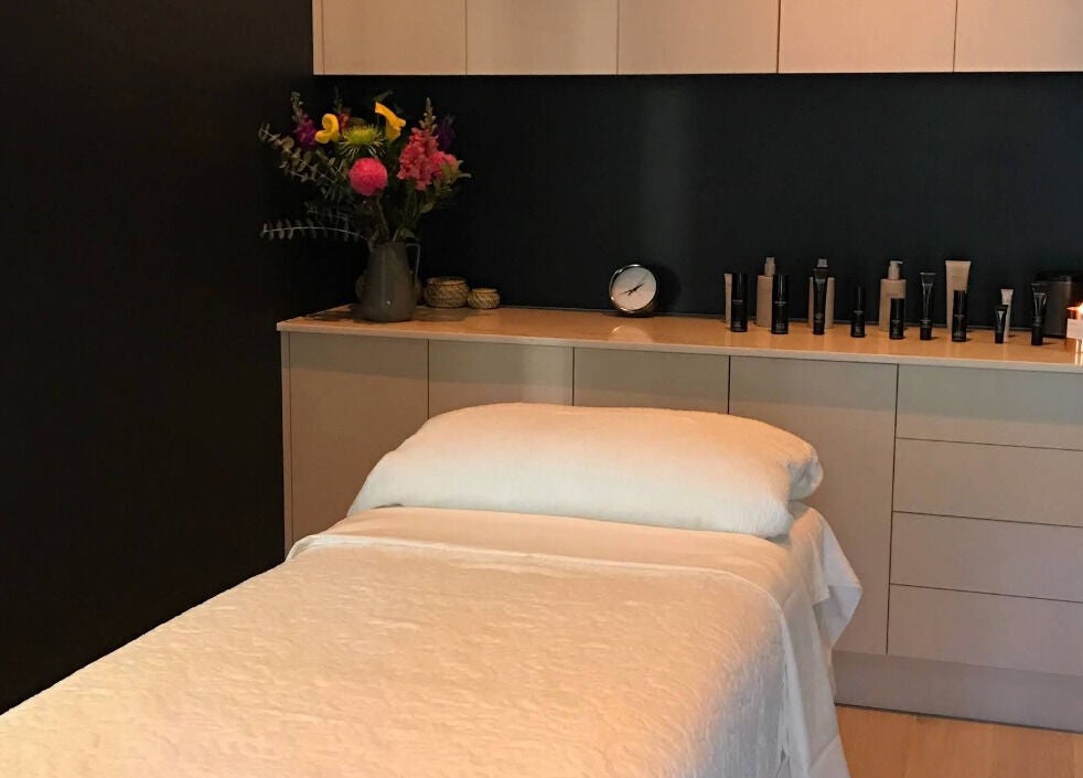 Serene massage room at Bump Day Spa, Double Bay, New South Wales, AU with elegant decor and soft lighting.