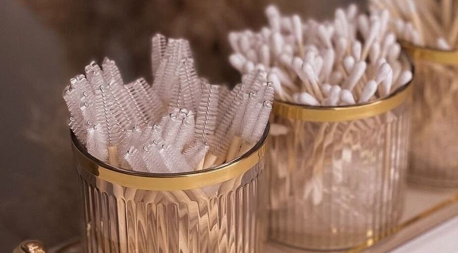 Elegant brush and swab holders at Slay Beauté Studio in Oakville, Ontario, CA for luxury beauty services.