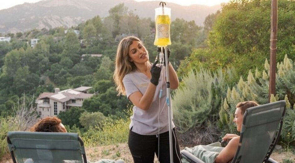 Outdoor vitamin injection session at Trio Pilates Vitamin Injection Pop up in Bridgewater, Massachusetts, US.