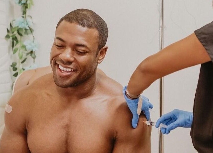 Man receives vitamin injection at Vitamin Injection Pop Up 1st Saturday of the Month, Raynham, Massachusetts, US.
