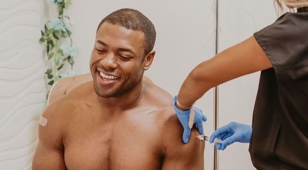 Man receives vitamin injection at Vitamin Injection Pop Up 1st Saturday of the Month, Raynham, Massachusetts, US.