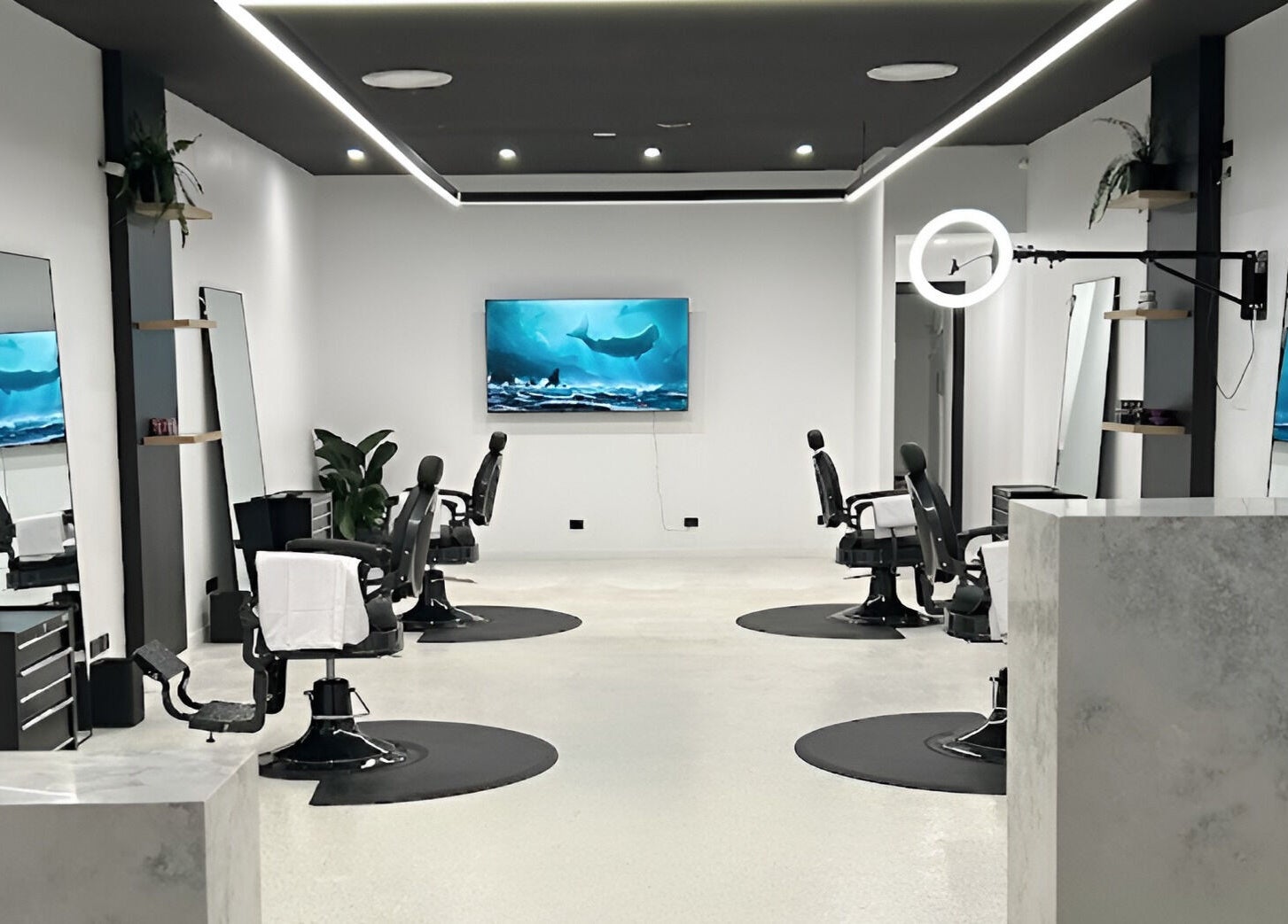 Modern interior of Eleven 11 Barber Studios in Coomera, Queensland, AU with stylish barber chairs.