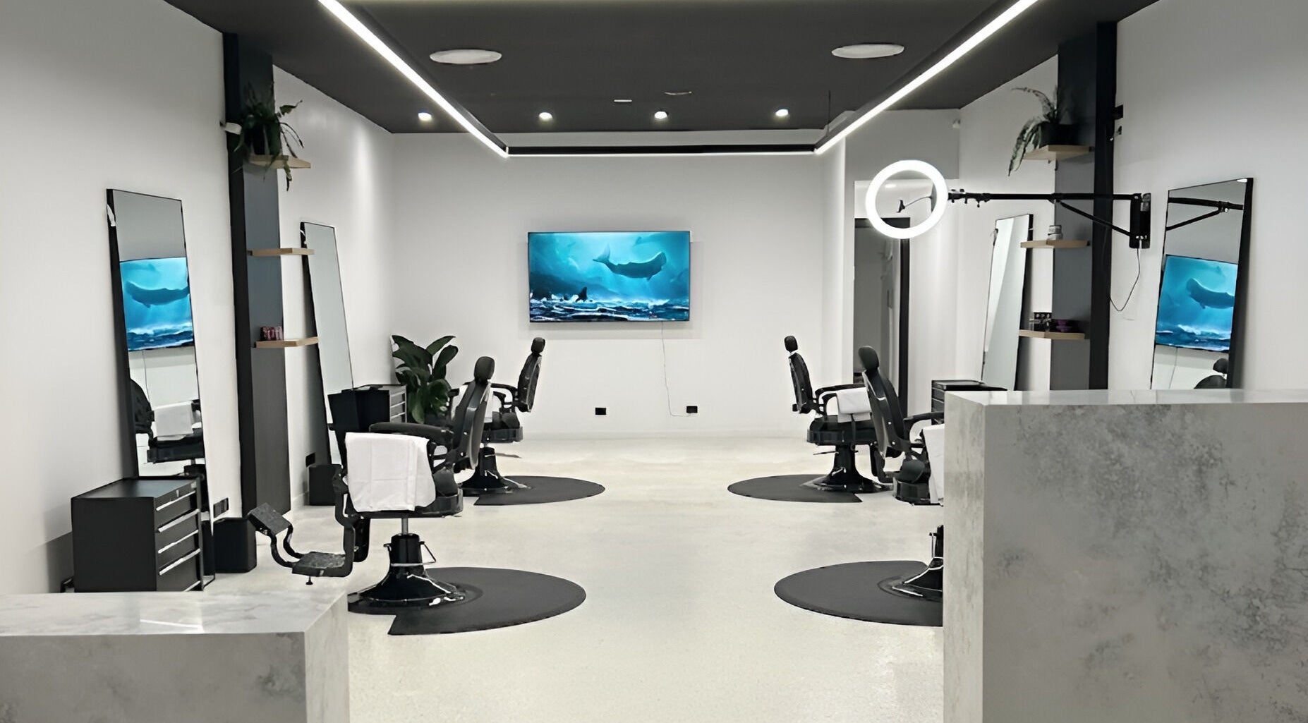 Modern interior of Eleven 11 Barber Studios in Coomera, Queensland, AU with stylish barber chairs.