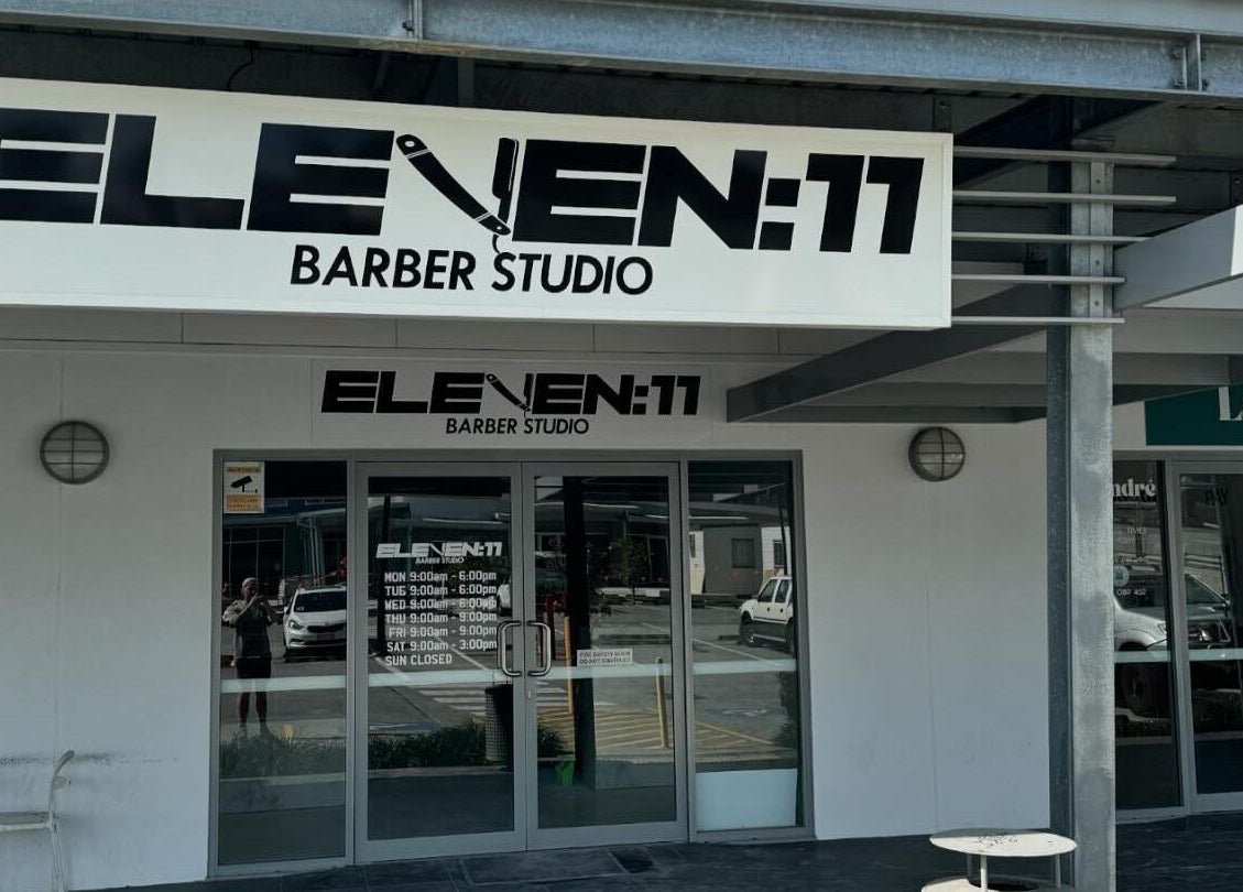 Entrance of Eleven 11 Barber Studios at Coomera, Queensland, AU with bold signage.
