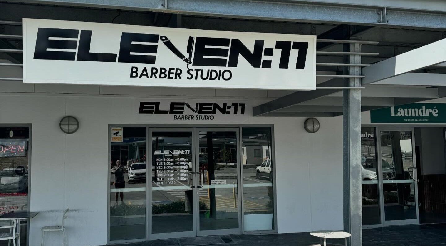 Entrance of Eleven 11 Barber Studios at Coomera, Queensland, AU with bold signage.