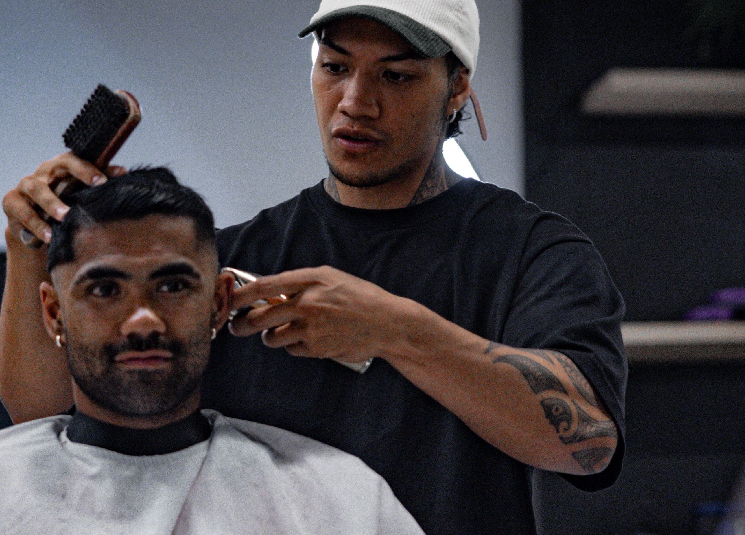 Professional barber styling at Eleven 11 Barber Studios, Coomera, Queensland, AU, enhancing client’s look.