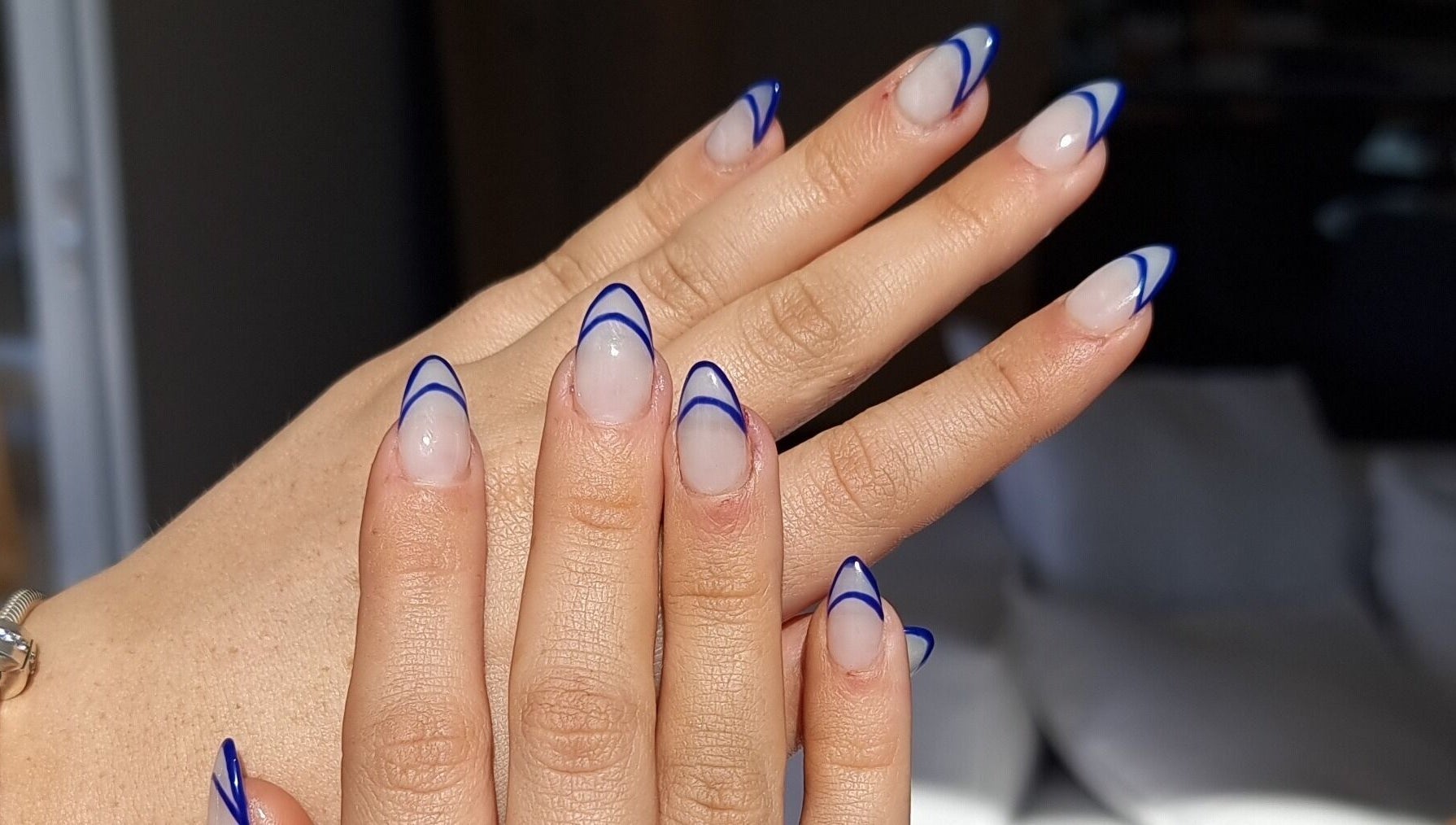 Stylish blue-tipped manicure at Absee Nail Studio, Surfers Paradise, Queensland, AU.