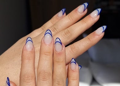 Stylish blue-tipped manicure at Absee Nail Studio, Surfers Paradise, Queensland, AU.