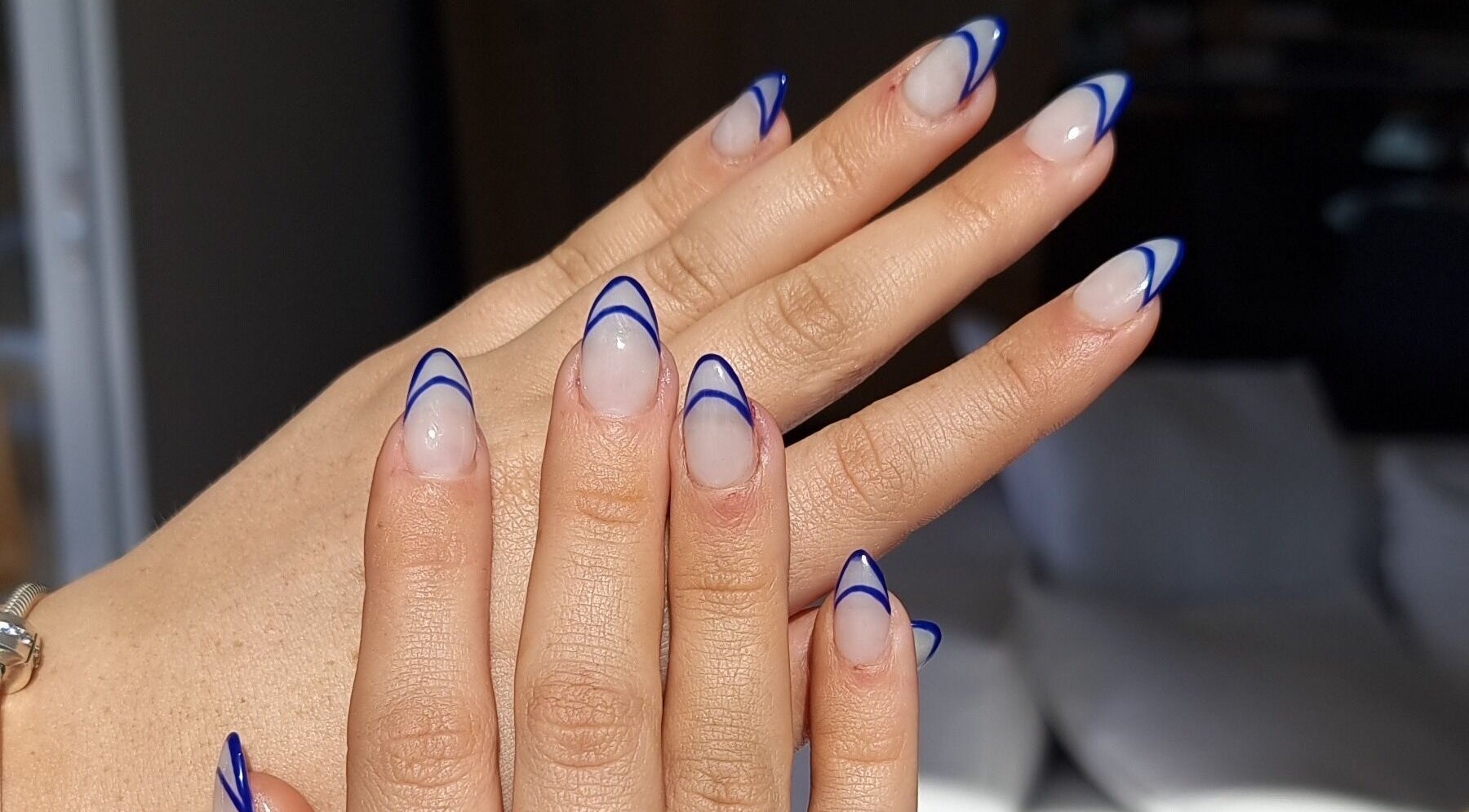 Stylish blue-tipped manicure at Absee Nail Studio, Surfers Paradise, Queensland, AU.