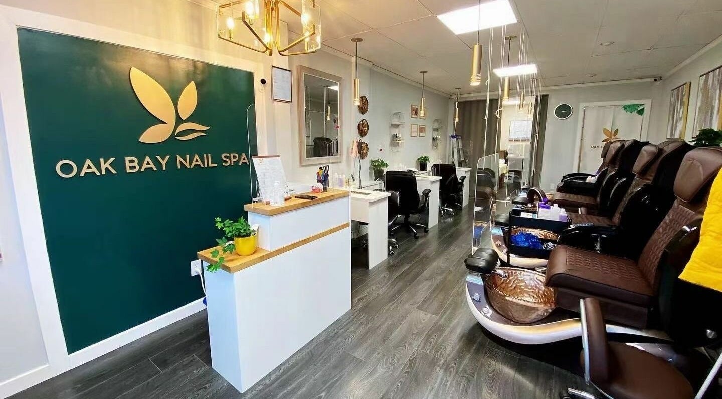 Interior of Oak Bay Nail Spa in Victoria, British Columbia, CA with plush seating and elegant decor.