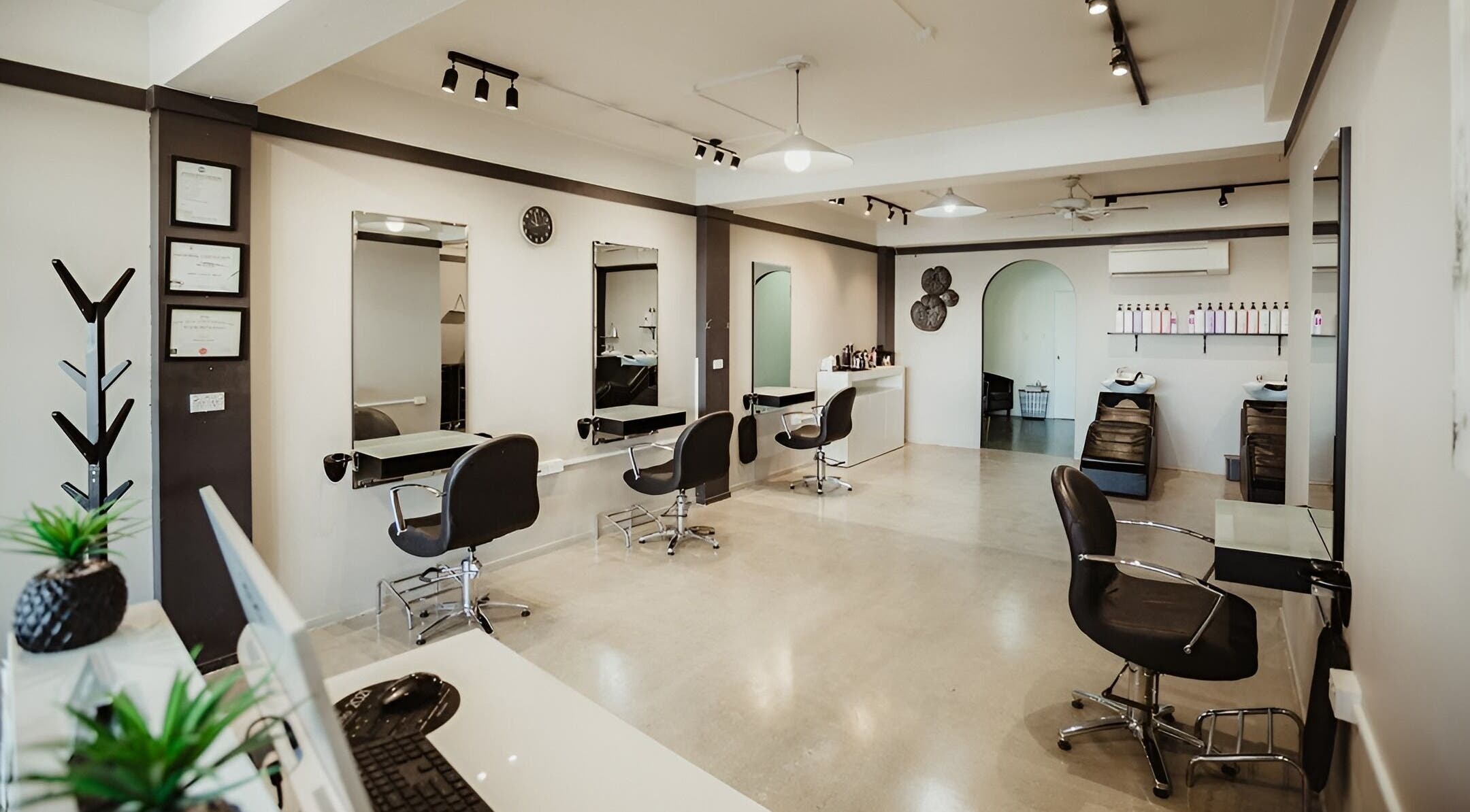 Modern interior of Cielo Hair and Beauty, Thames, Waikato, NZ, featuring stylish salon chairs and mirrors.