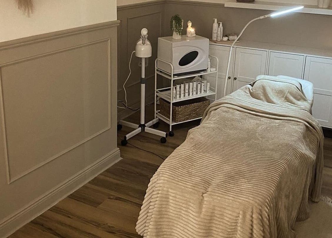 Relaxing treatment room at Annalise Skin and Beauty Studio, County Offaly, IE with a massage bed and warm lighting.