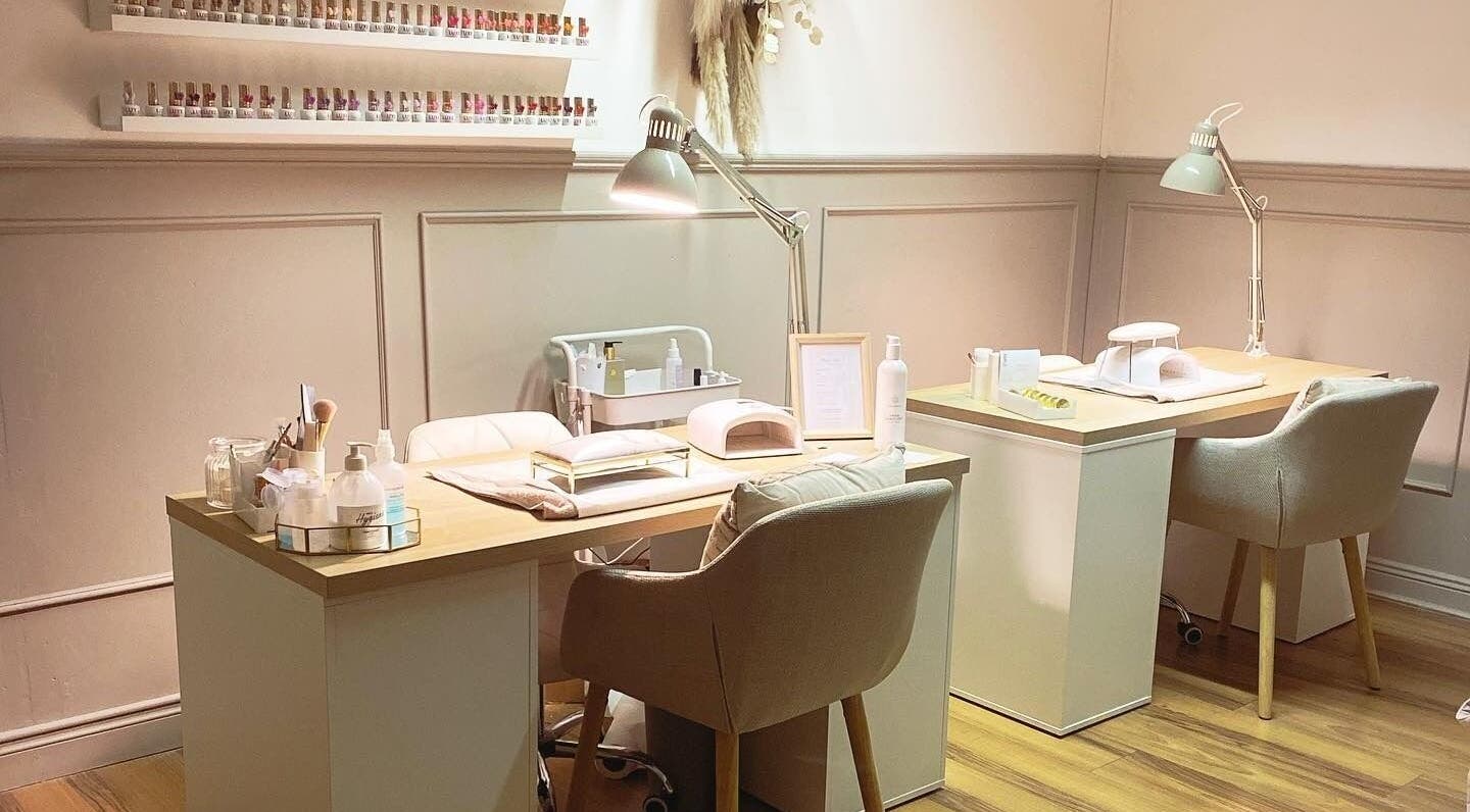 Nail area at Annalise Skin and Beauty Studio in County Offaly, IE, featuring modern workstations and decor.