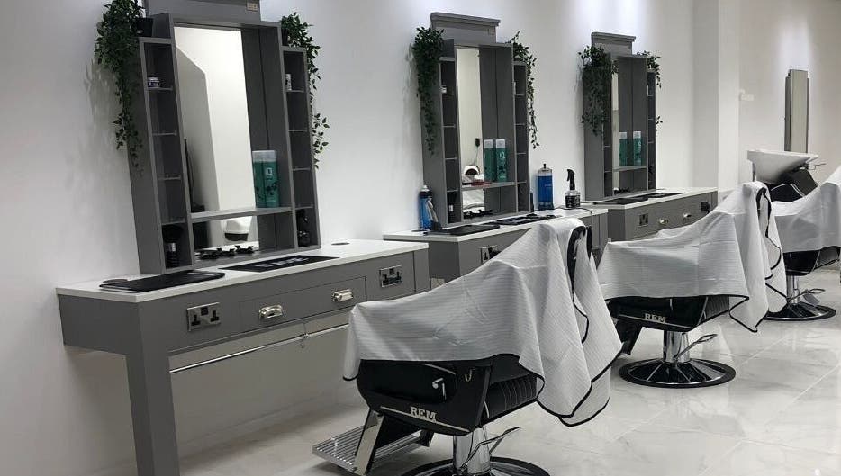 Modern barber stations at House Of Luxxe Barbers Ltd, Yate, England, GB, exuding a contemporary aesthetic.