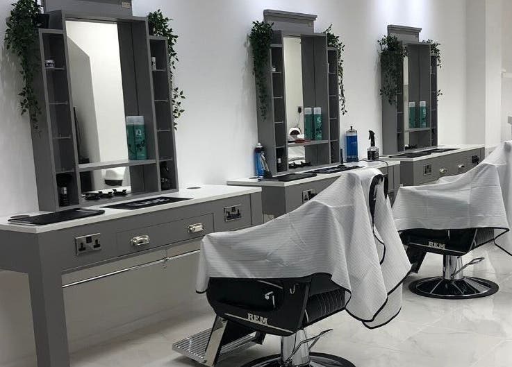 Modern barber stations at House Of Luxxe Barbers Ltd, Yate, England, GB, exuding a contemporary aesthetic.
