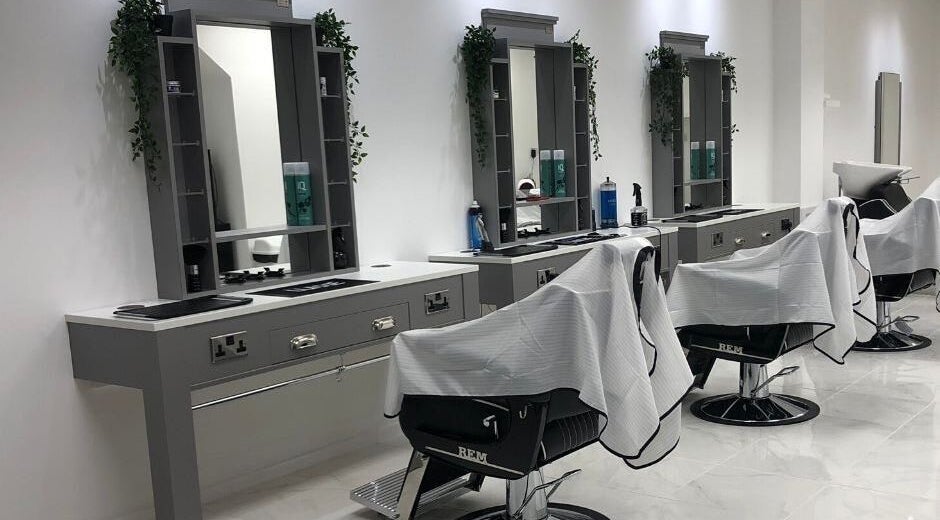 Modern barber stations at House Of Luxxe Barbers Ltd, Yate, England, GB, exuding a contemporary aesthetic.
